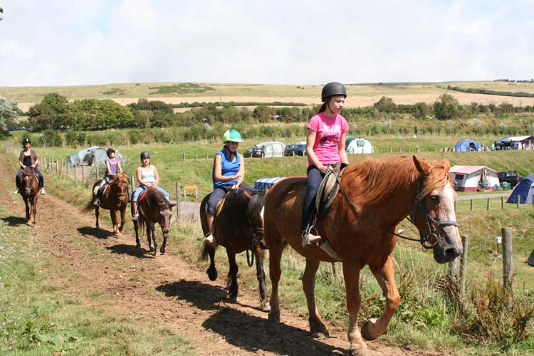 080903-Pony_trekking_Burton_Bradstock-John_Burge