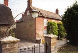 An older house of Forest Marble has an 18th century brick front.