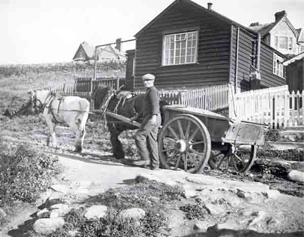 Taking shingle off the beach in cart c1935 