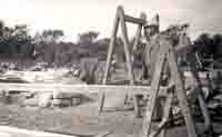 Charlie Hitchcock surveys the building of new cottages by Girt House