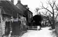 Another view of the cottages beside Girt House before the fire