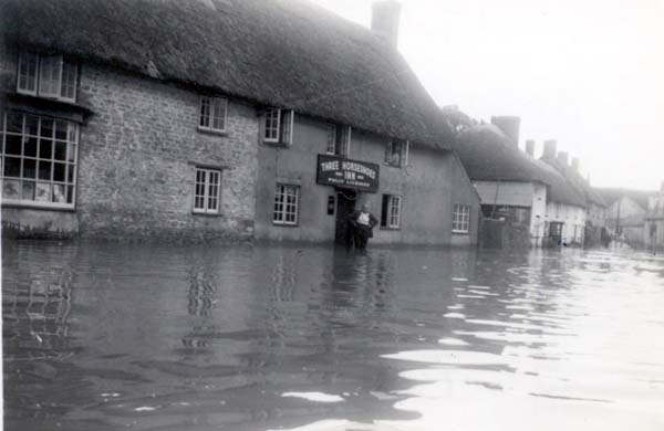 Harold Greenham, landlord of the Three Horseshoes, looking for customers?