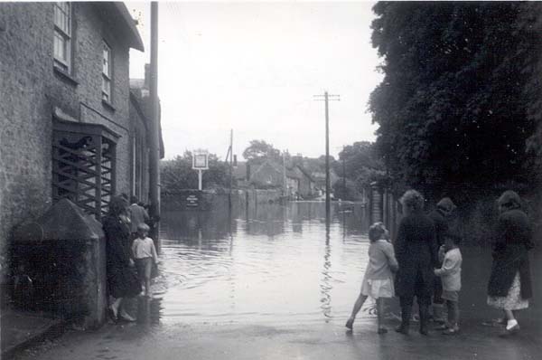 Pedestrians wondering how to get  through