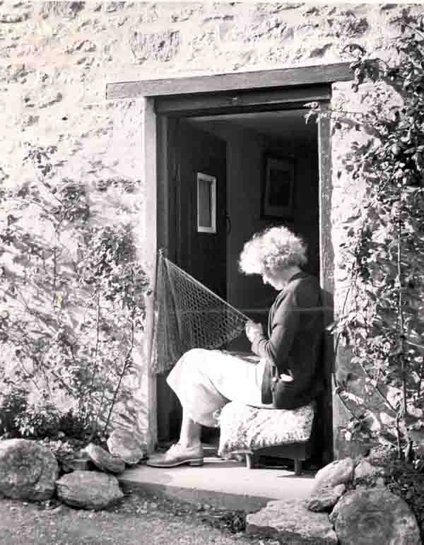 Braiding a net at the door