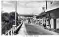 Looking north past the village store with an Ice Cream sign outside