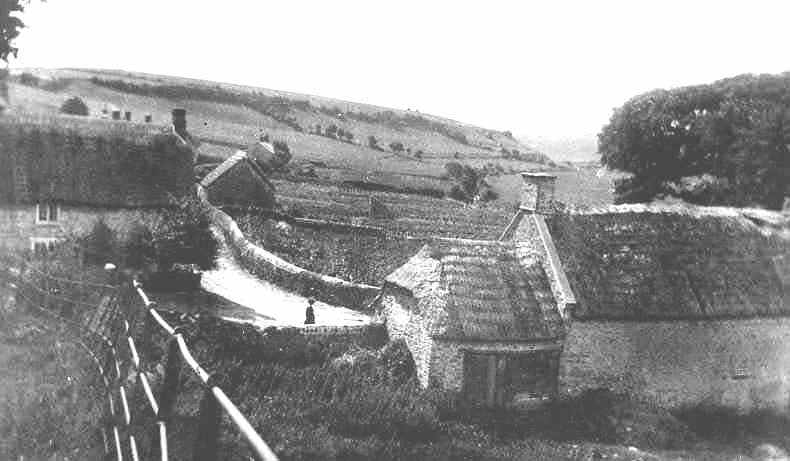 View at the end of Southover over a large barn known as the Cow Barker