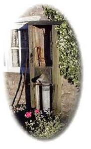 Old Village Pump in Burton Bradstock, by the village Green  